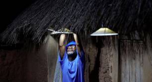 Electricity technician working on a lamp