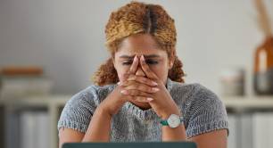 Stressed woman at work 