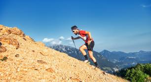 Man climbing rocky slope